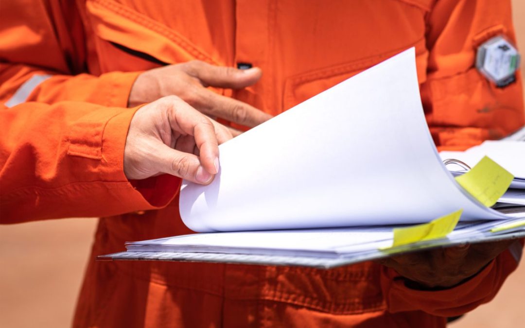 Construction company looking over insurance paperwork